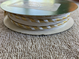 1/2" cord edge trim white-gold 10 yards